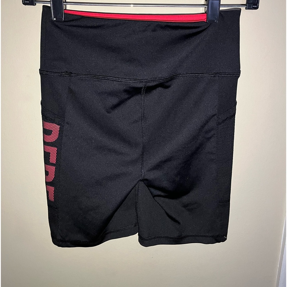 Black / pink “bebe” biker shorts
